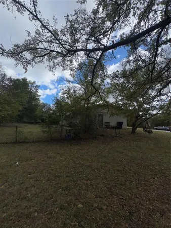 a view of patio and yard