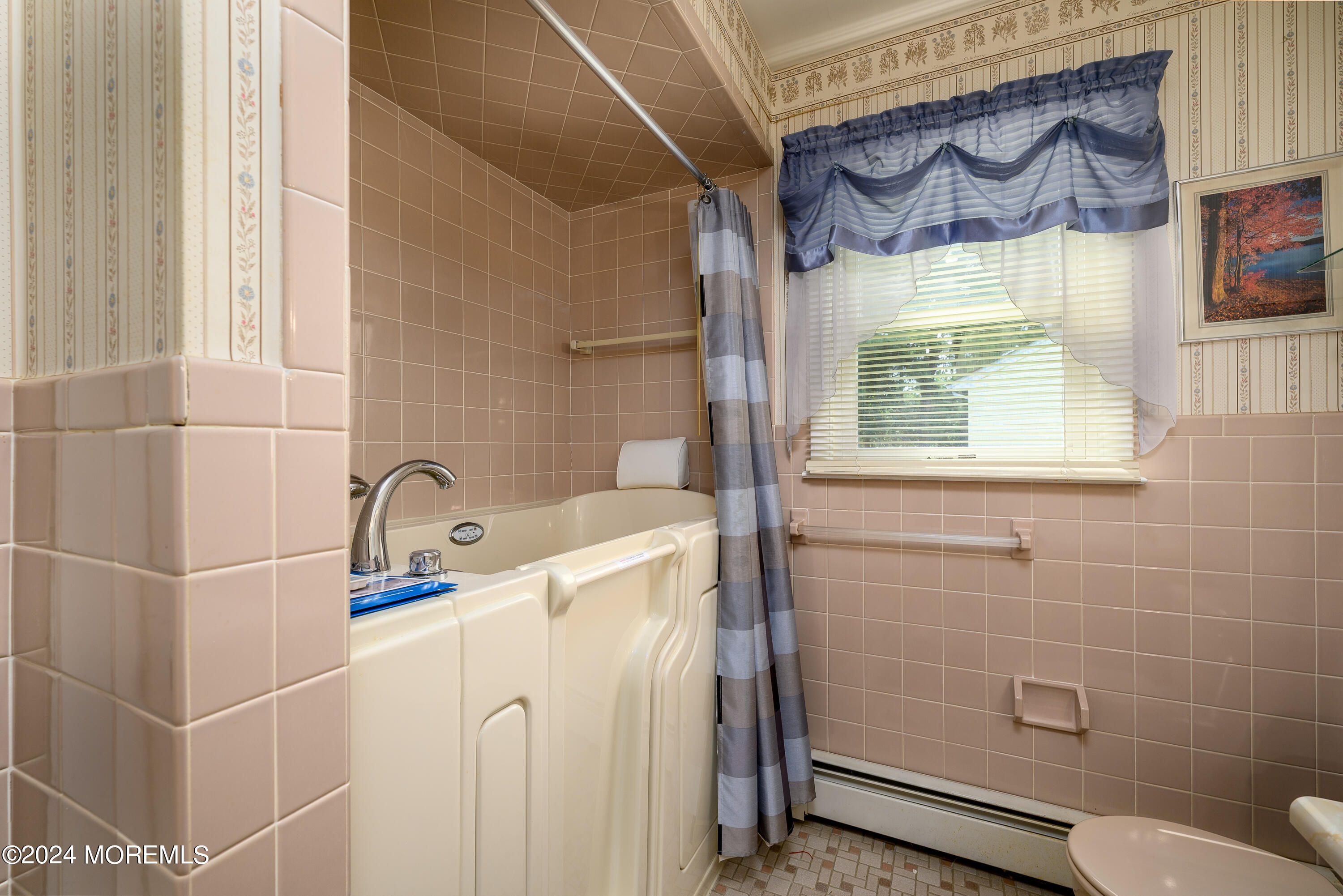 56 Auburn Road Toms River, NJ 08757 - Photo 25 of 28 a bathroom with a sink toilet and shower