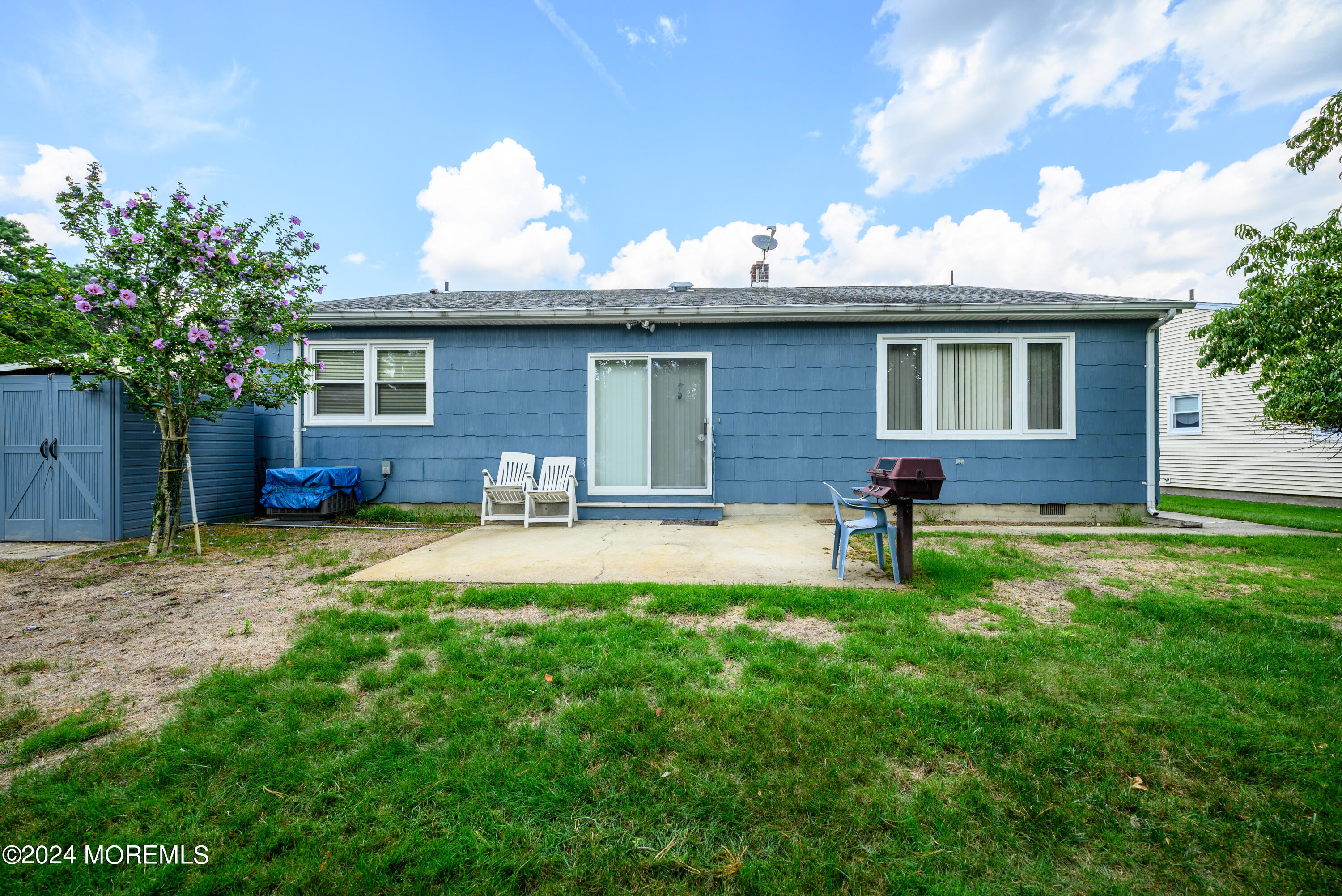 56 Auburn Road Toms River, NJ 08757 - Photo 3 of 28 a house view with a seating space and garden