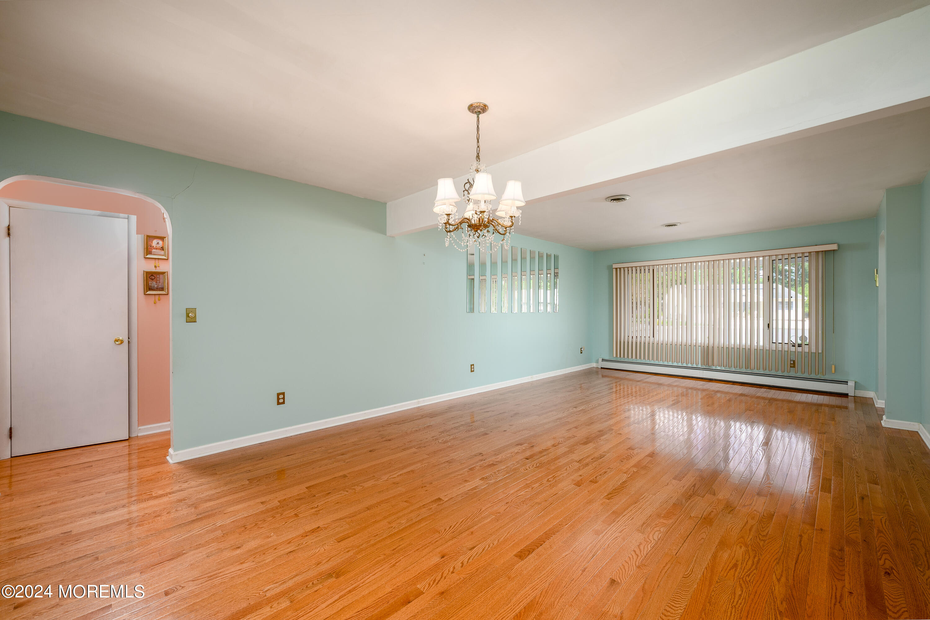 56 Auburn Road Toms River, NJ 08757 - Photo 7 of 28 a view of room with window and wooden floor