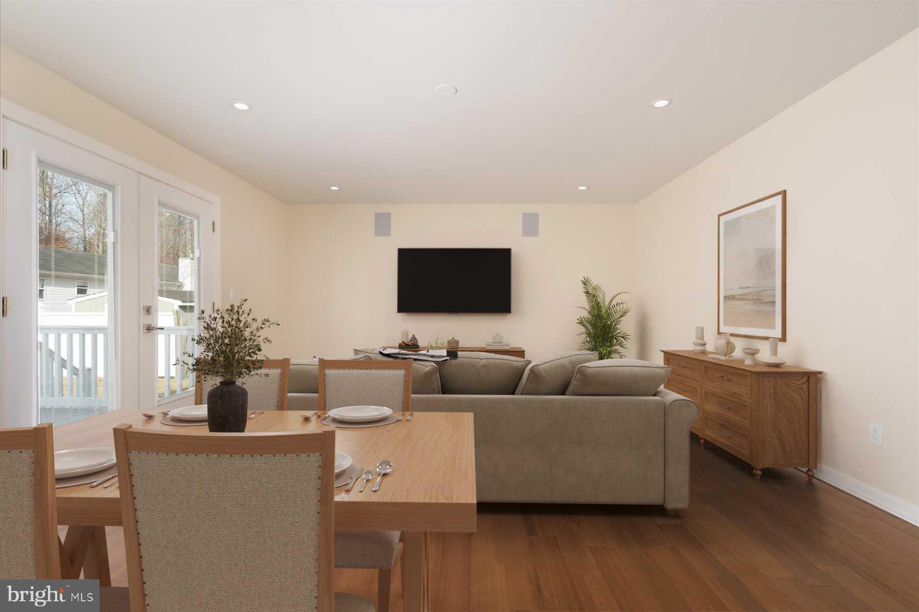 2942 Southaven Drive Annapolis, MD 21401 - Photo 12 of 41 a living room with furniture and a flat screen tv