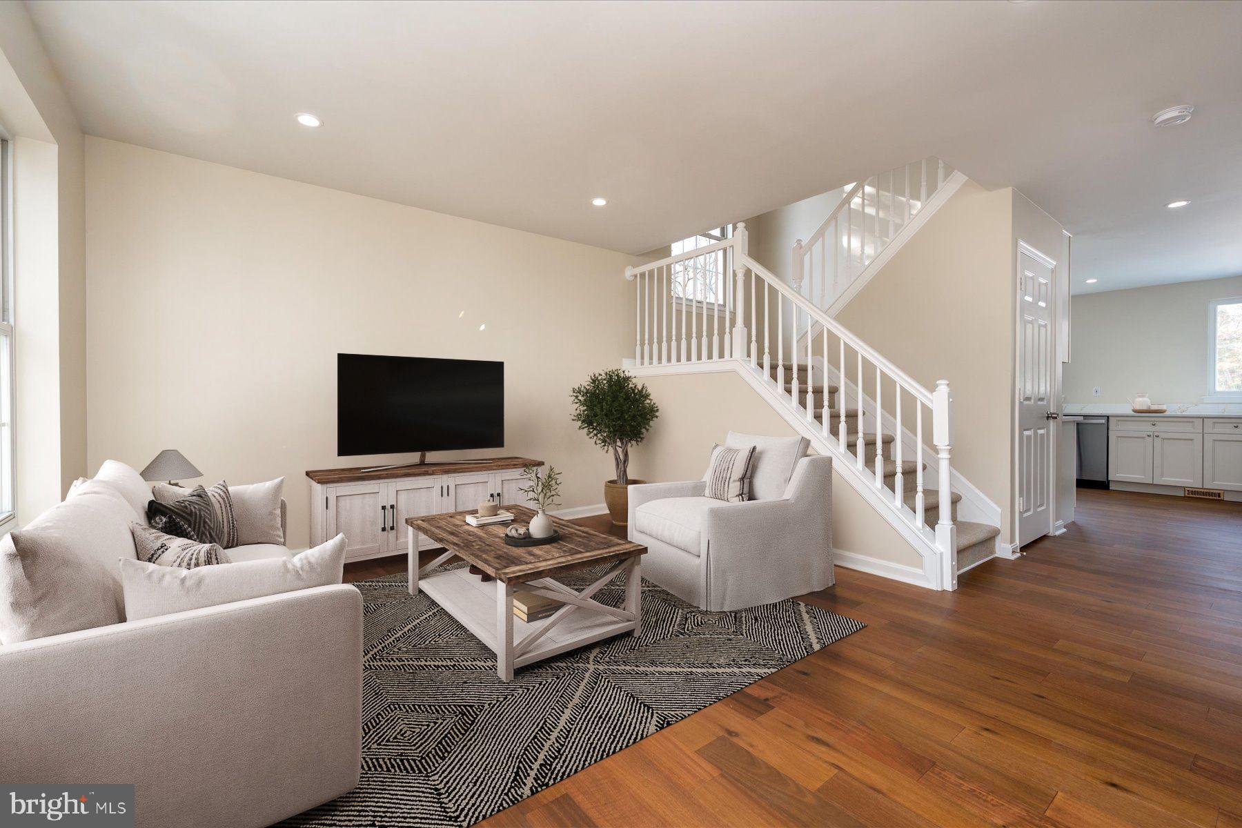 2942 Southaven Drive Annapolis, MD 21401 - Photo 13 of 41 a living room with furniture and a flat screen tv
