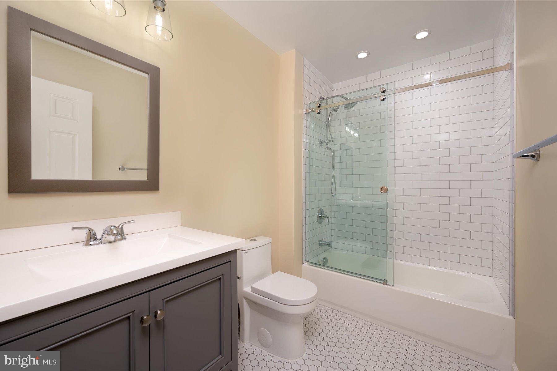2942 Southaven Drive Annapolis, MD 21401 - Photo 23 of 41 a bathroom with a sink a toilet and shower