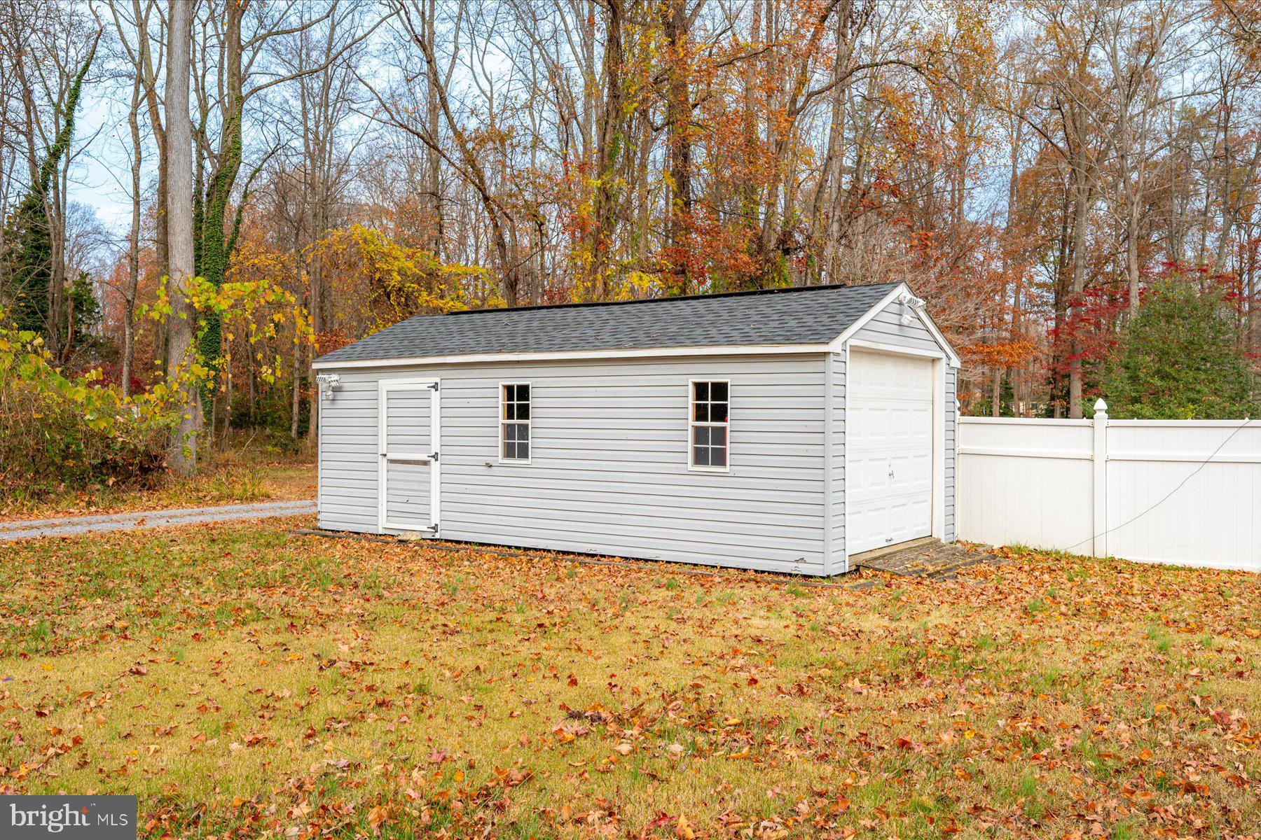 2942 Southaven Drive Annapolis, MD 21401 - Photo 27 of 41 a house with trees in front of it