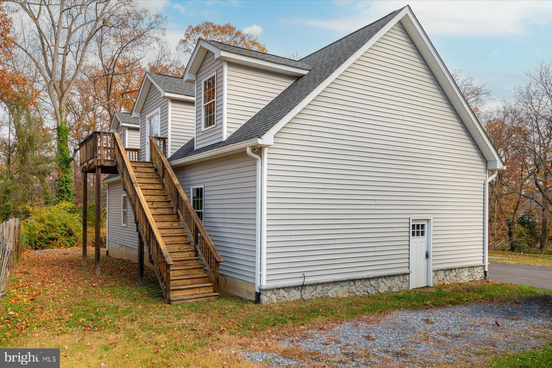 2942 Southaven Drive Annapolis, MD 21401 - Photo 32 of 41 a view of a house with a yard