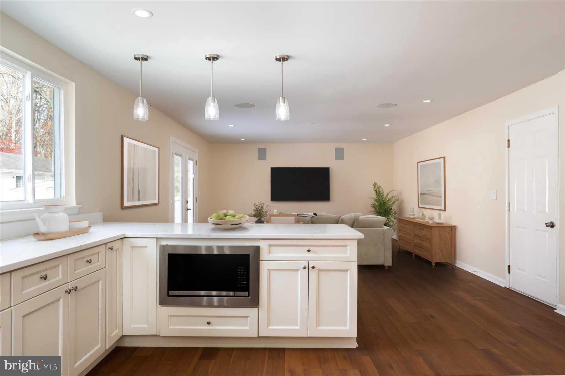2942 Southaven Drive Annapolis, MD 21401 - Photo 10 of 41 a kitchen that has a lot of cabinets in it and wooden floor