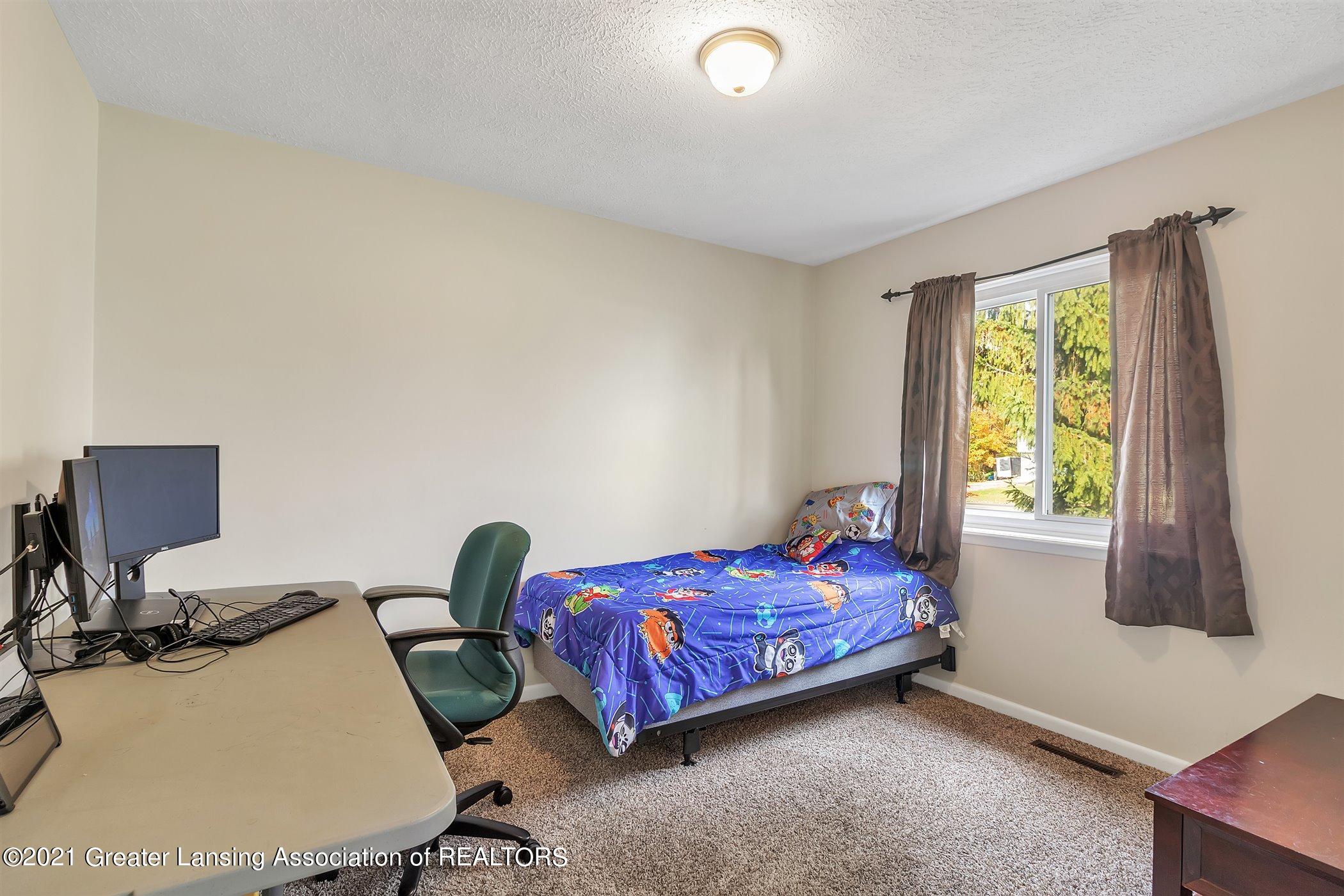 4001 Dell Road Lansing, MI 48911 - Photo 23 of 33 25-4001 Dell-windowstill-realestate