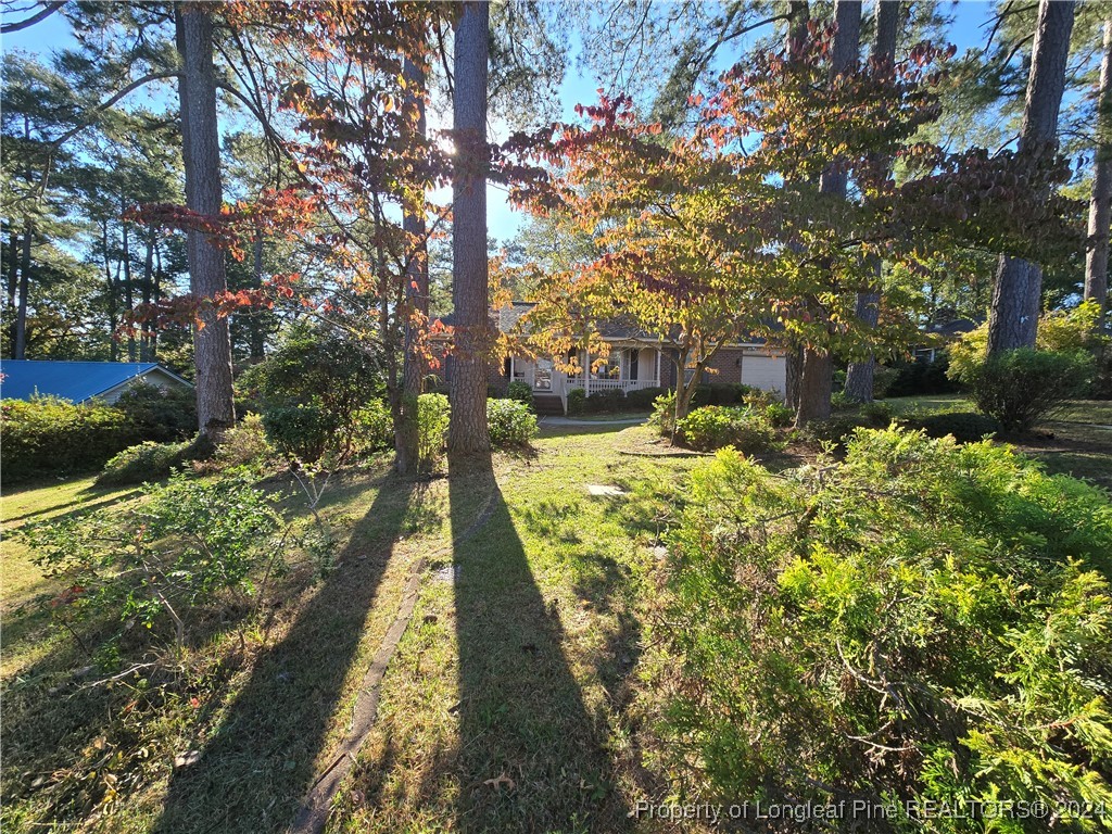 6400 Milford Road Fayetteville, NC 28303 - Photo 2 of 23 a view of an outdoor space with a lake view