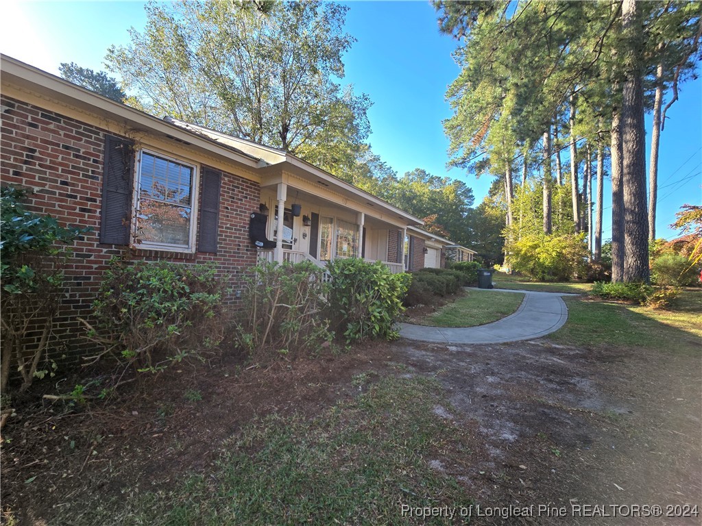 6400 Milford Road Fayetteville, NC 28303 - Photo 3 of 23 a view of a house with a yard
