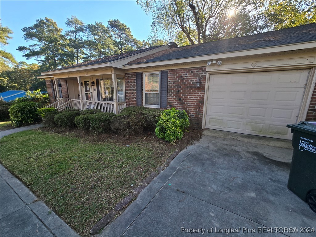 6400 Milford Road Fayetteville, NC 28303 - Photo 4 of 23 a view of house with outdoor space