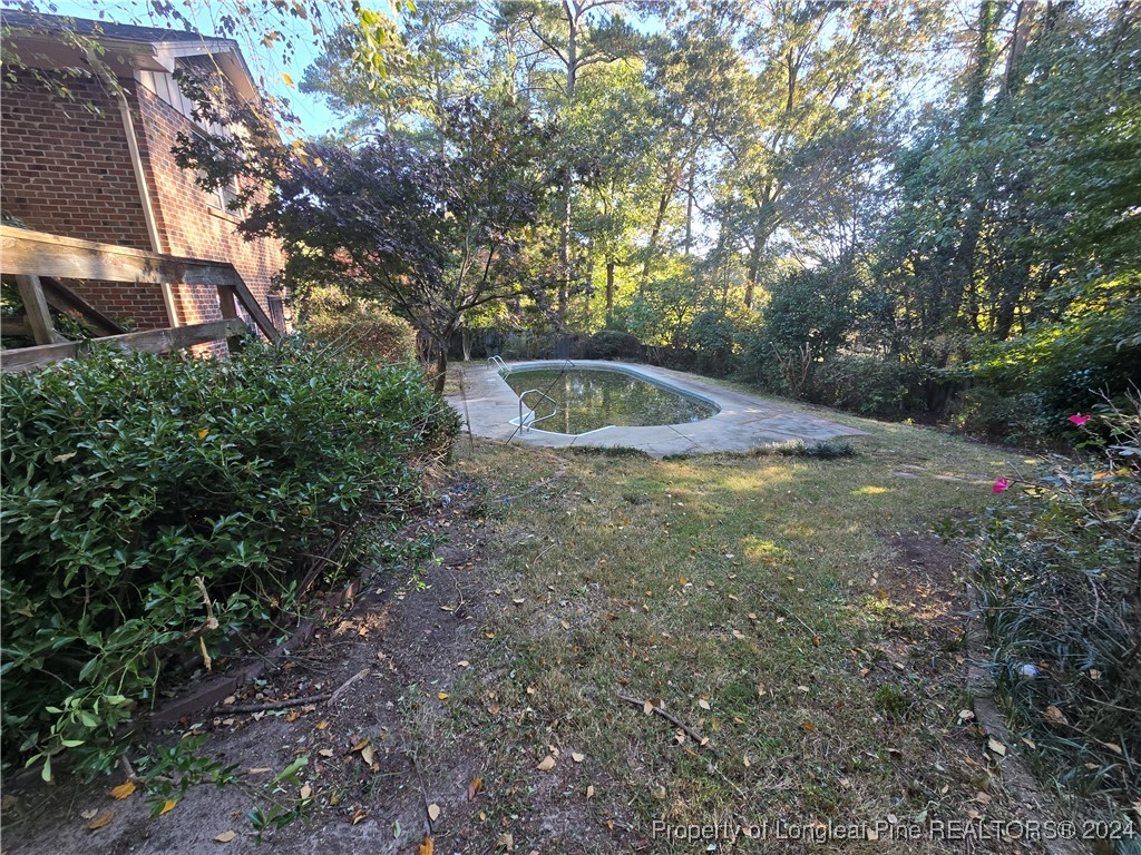 6400 Milford Road Fayetteville, NC 28303 - Photo 8 of 23 a view of backyard with green space