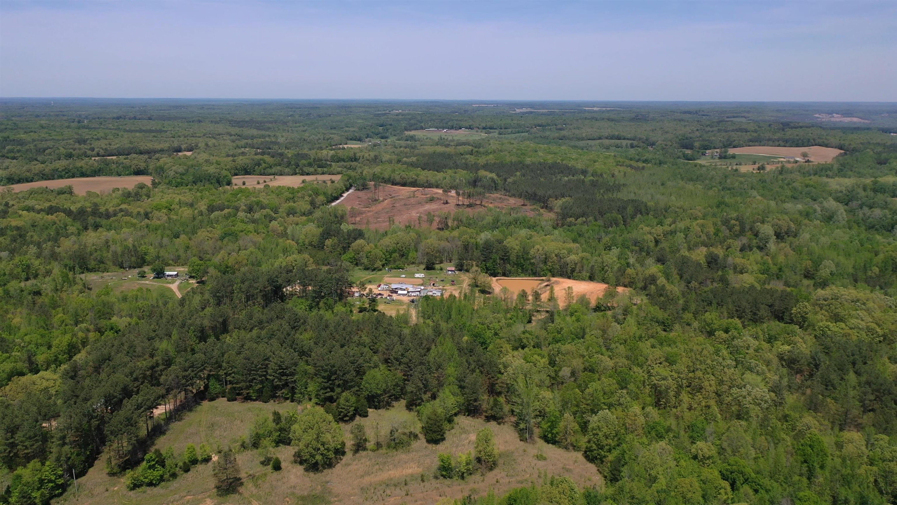 Lot#9 Malone Cemetery Road Finger, TN 38334 - Photo 6 of 13 an aerial view of residential houses with outdoor space and trees