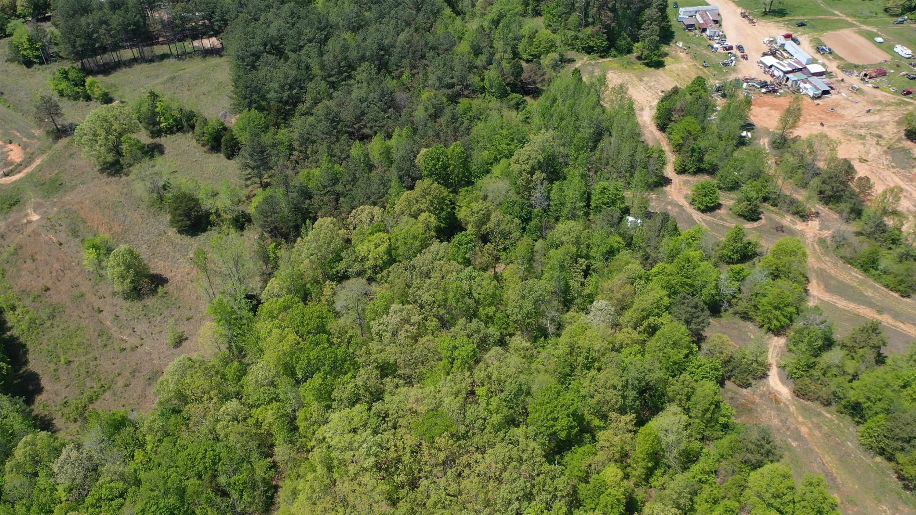 Lot#9 Malone Cemetery Road Finger, TN 38334 - Photo 9 of 13 an aerial view of residential house with outdoor space and trees all around