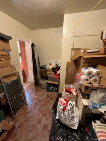 a view of street with parked cars