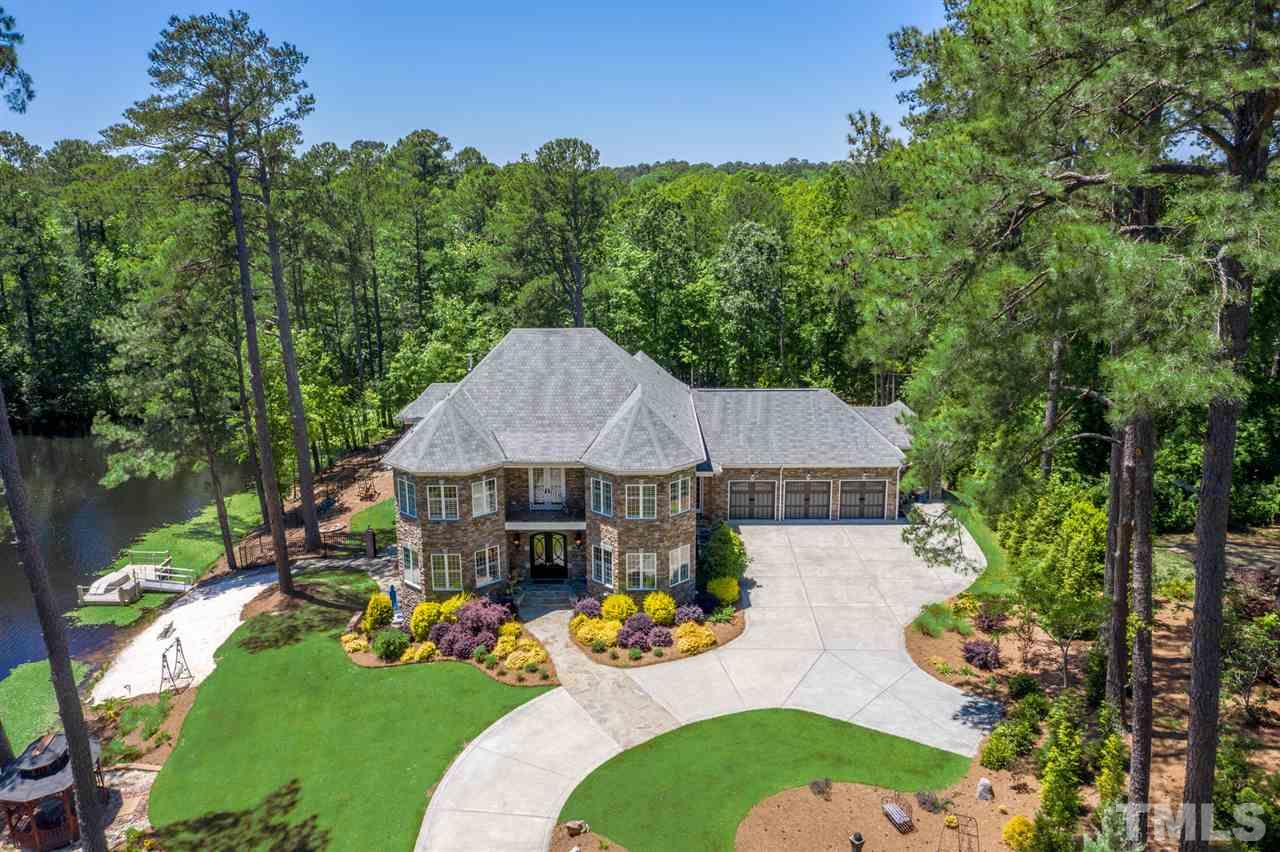Completely custom solar home nestled at the end of a cul-de-sac, backing up to Enchanted Oaks million dollar neighborhood. Home is all stone and brick-no siding. Special order roof tiles. Handmade hardware for garage doors.
