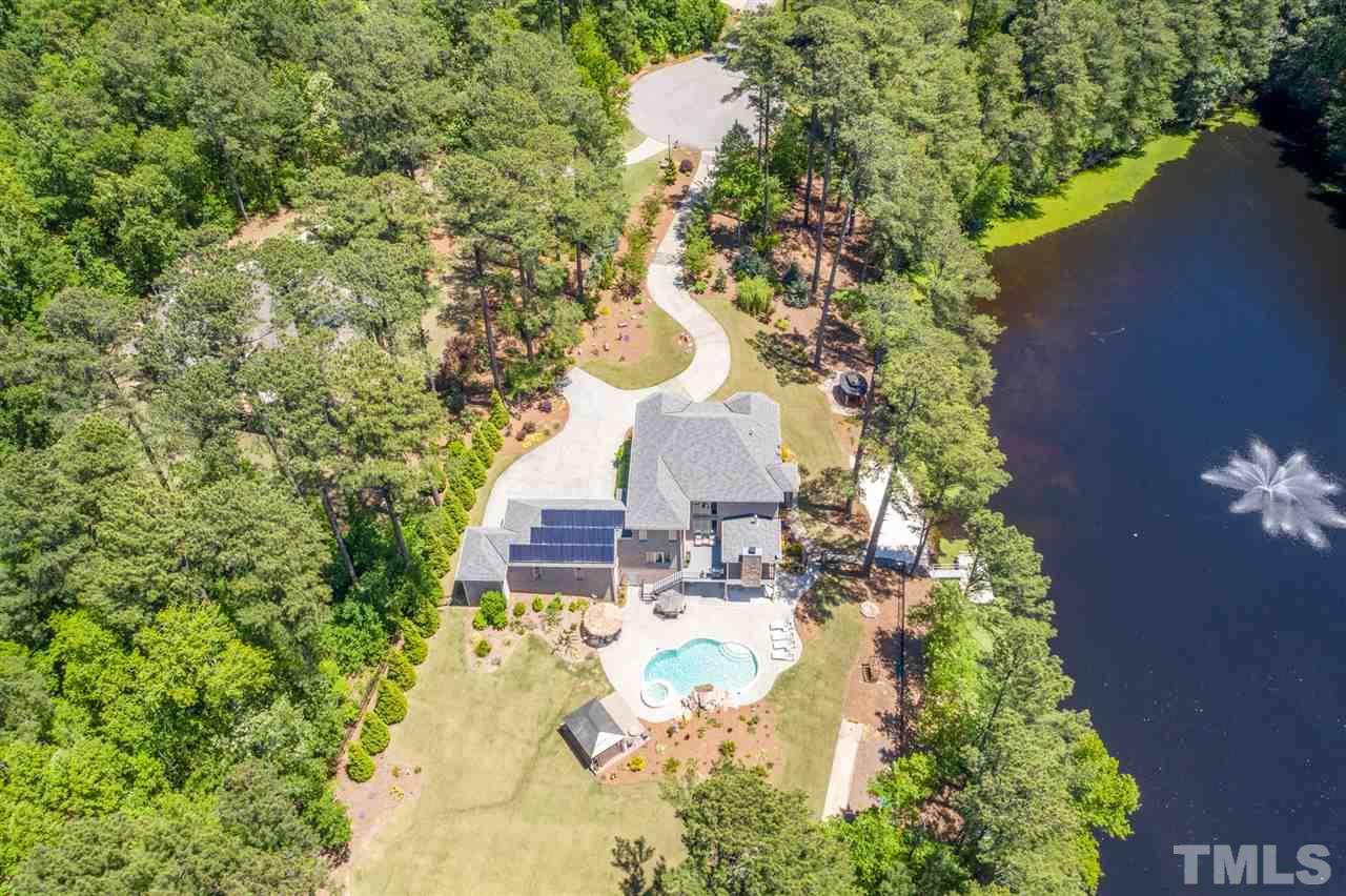 1209 Graedon Drive Raleigh, NC 27603 - Photo 2 of 30 Land allows room for another structure such as barn, shed, workshop. Zones for horses. Smart home holiday lighting-turn on and off with one switch!