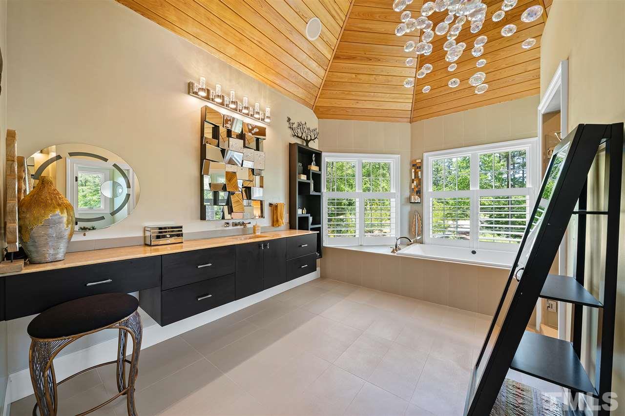 1209 Graedon Drive Raleigh, NC 27603 - Photo 16 of 30 Oversized air tub with views of pond. Radiant heat floors.