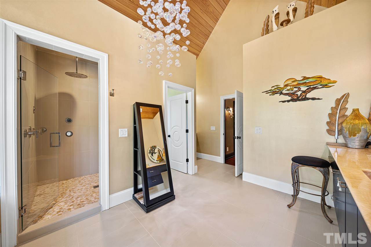 1209 Graedon Drive Raleigh, NC 27603 - Photo 17 of 30 His and hers vanity areas with onyx counter tops.