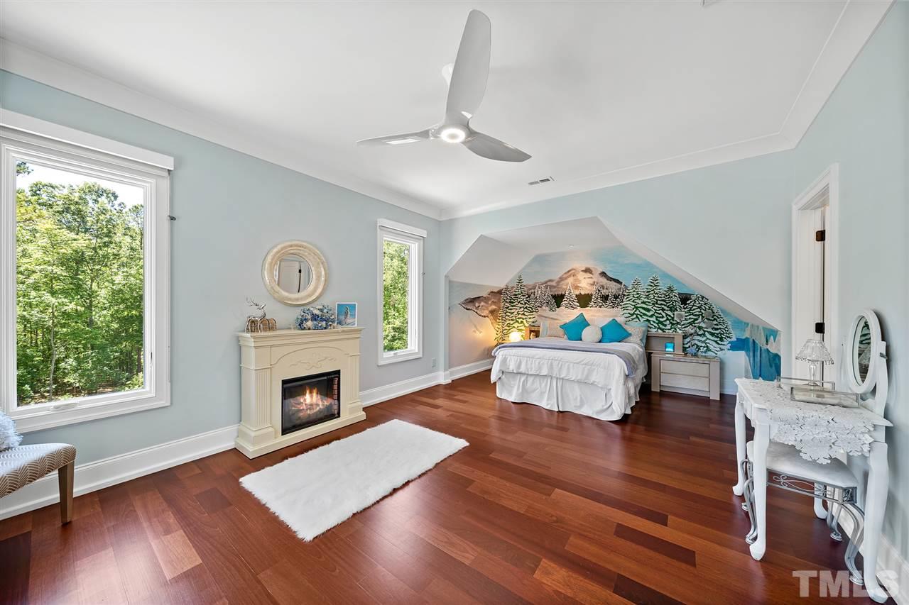 1209 Graedon Drive Raleigh, NC 27603 - Photo 19 of 30 Expansion opportunity! 992 sq.ft of Unfinished area adjacent to this bedroom. Accessed via the garage for a peek.