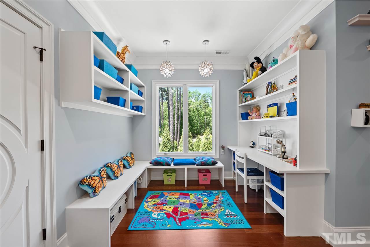 1209 Graedon Drive Raleigh, NC 27603 - Photo 21 of 30 Designed open so it can be viewed from all bedrooms and from downstairs. Custom Built-ins!