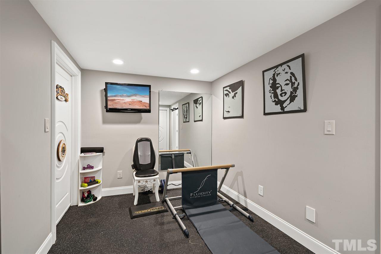 1209 Graedon Drive Raleigh, NC 27603 - Photo 29 of 30 Commercial grade rubber flooring. Full wall mirror.