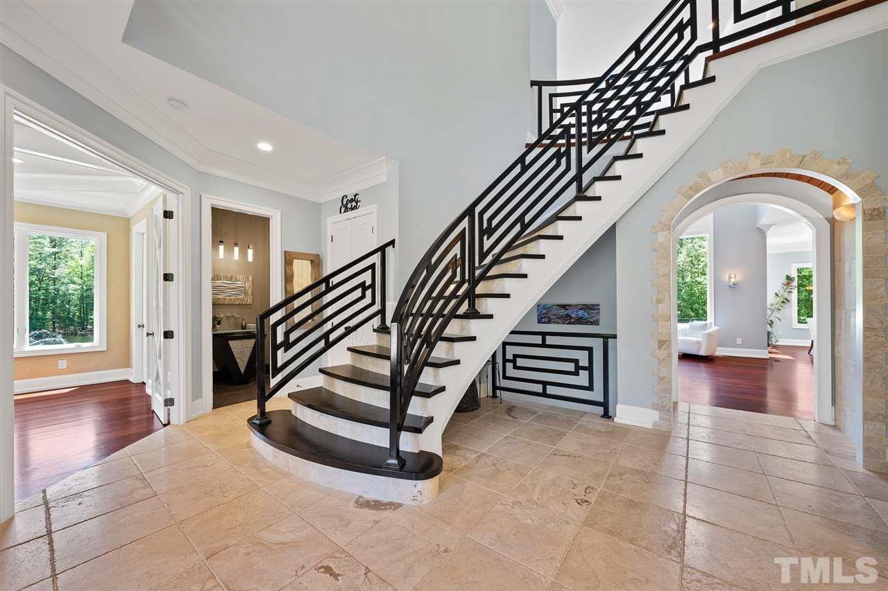 1209 Graedon Drive Raleigh, NC 27603 - Photo 4 of 30 Custom designed handmade railings, Imported Travertine tile w/onyx flooring