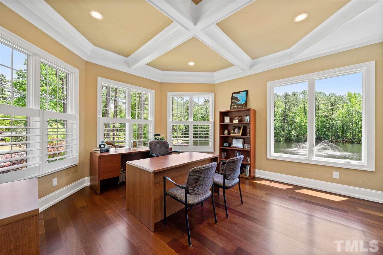 1209 Graedon Drive Raleigh, NC 27603 - Photo 6 of 30 Dramatic views of Serenity Pond. Gorgeous coffered ceiling.