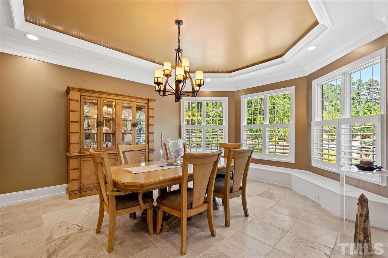 1209 Graedon Drive Raleigh, NC 27603 - Photo 7 of 30 Onyx and LED lighting, bench window seating that opens for storage, and plantation shutters.
