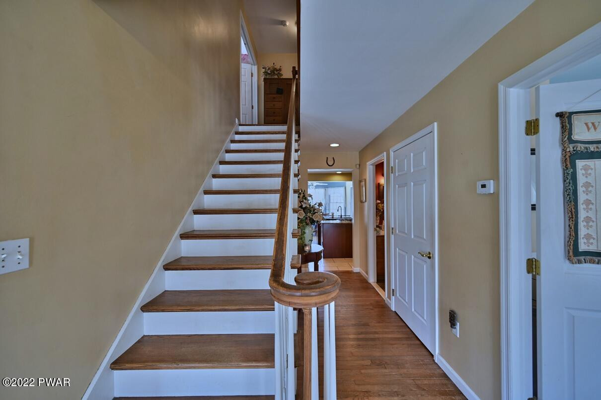 183 Valleyview Road Greentown, PA 18426 - Photo 9 of 110 a view of a hallway with wooden floor and entryway