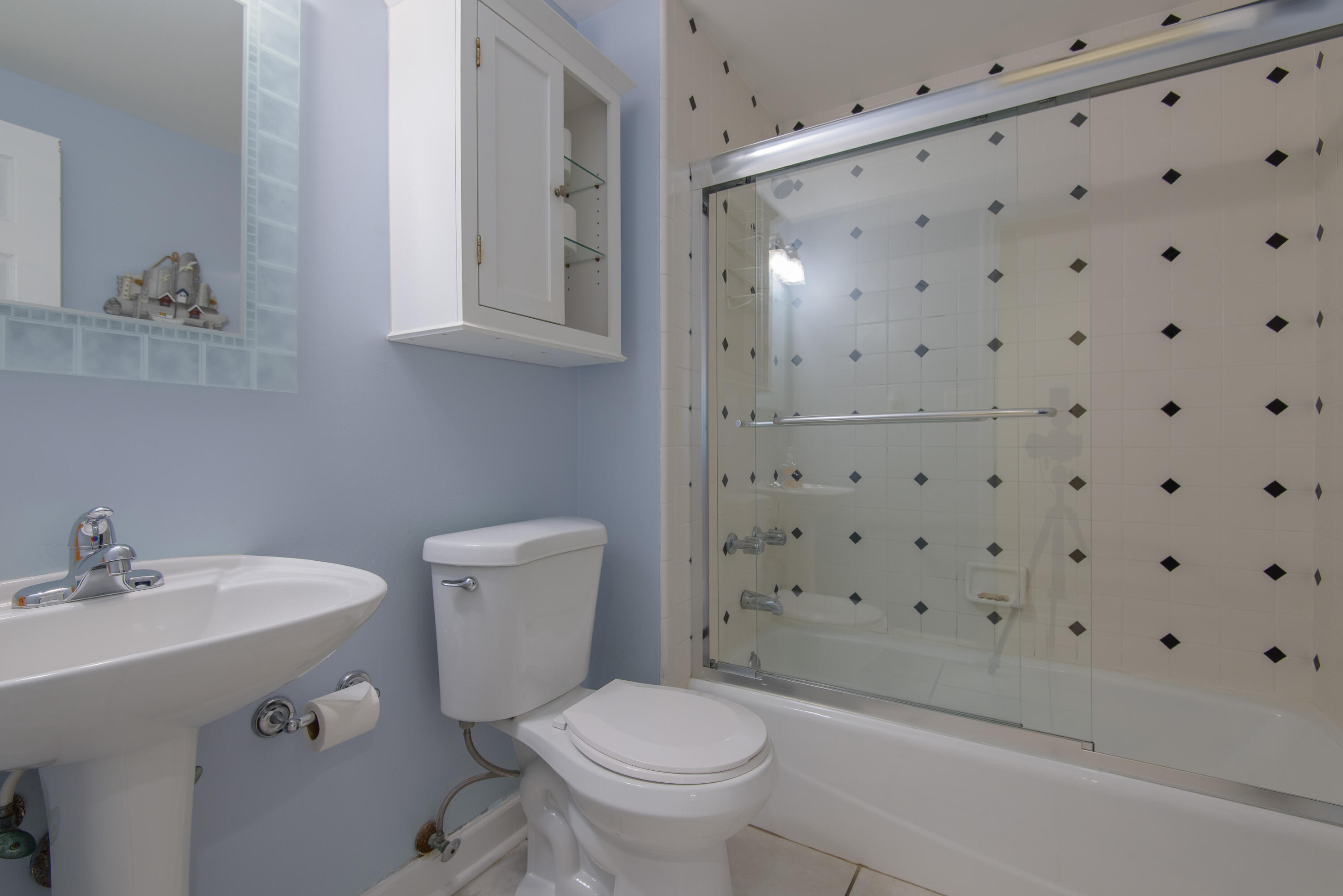 502 Porter Lane Key West, FL 33040 - Photo 11 of 38 a bathroom with a sink toilet and shower