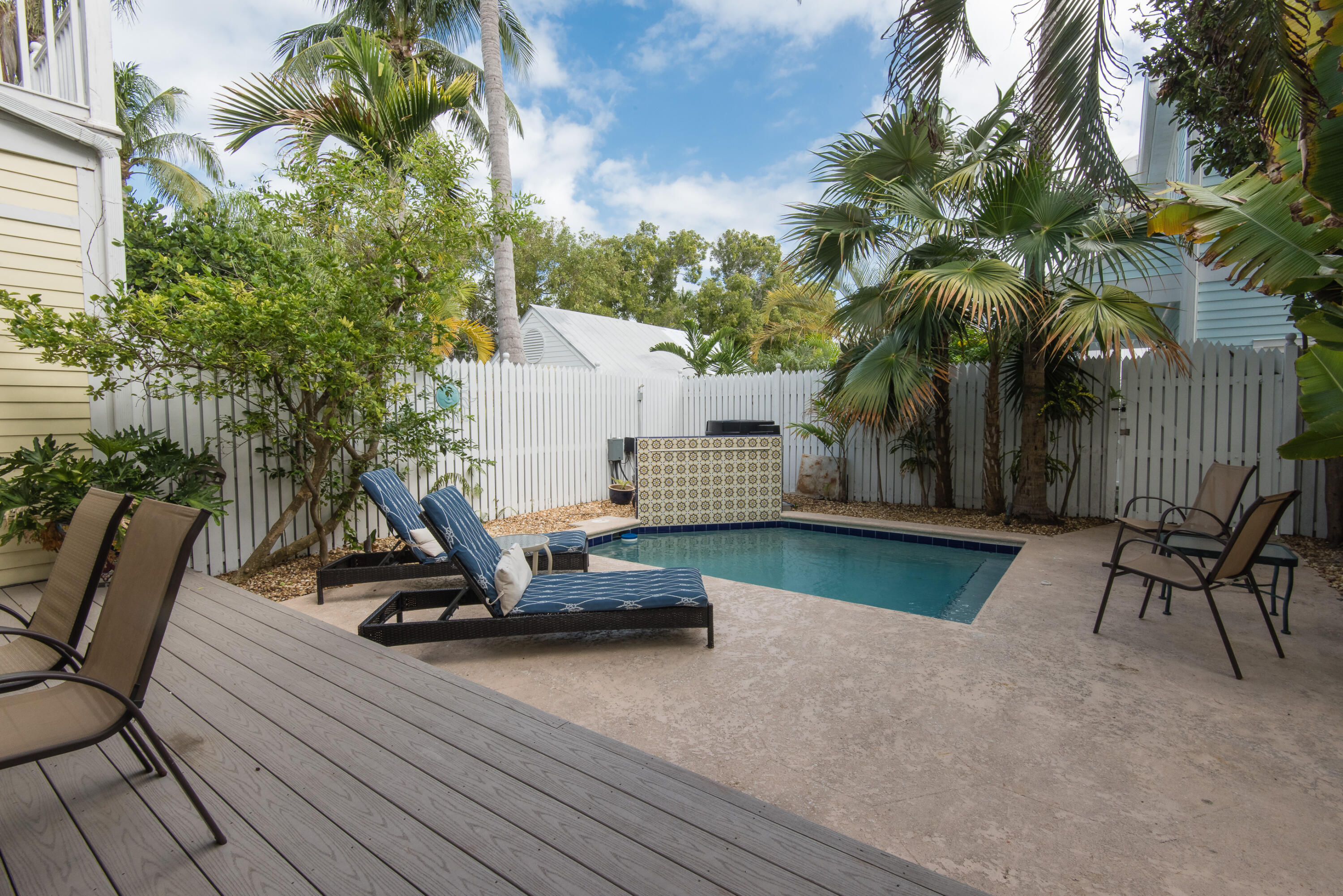 502 Porter Lane Key West, FL 33040 - Photo 17 of 38 a view of a patio with a table and chairs