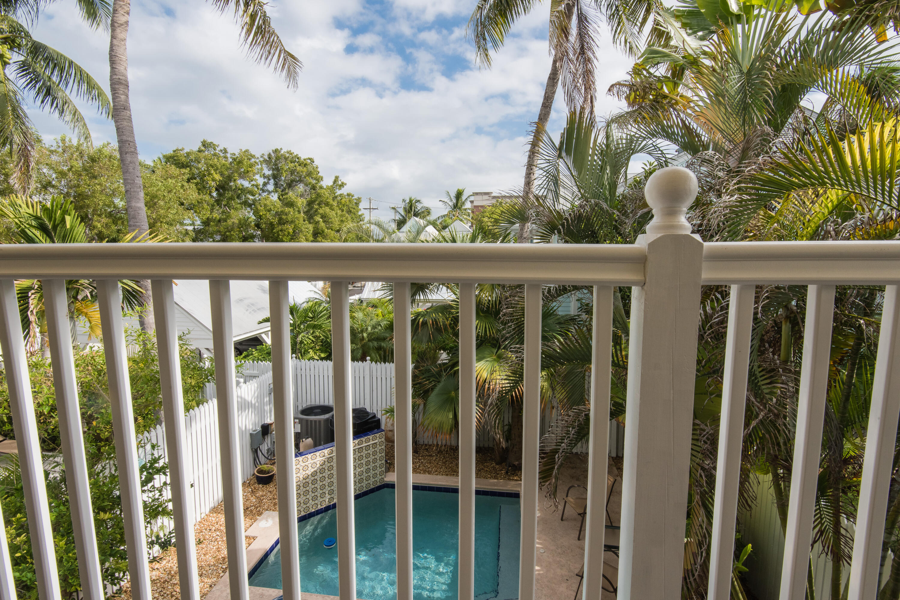 502 Porter Lane Key West, FL 33040 - Photo 25 of 38 a view of a balcony with chairs