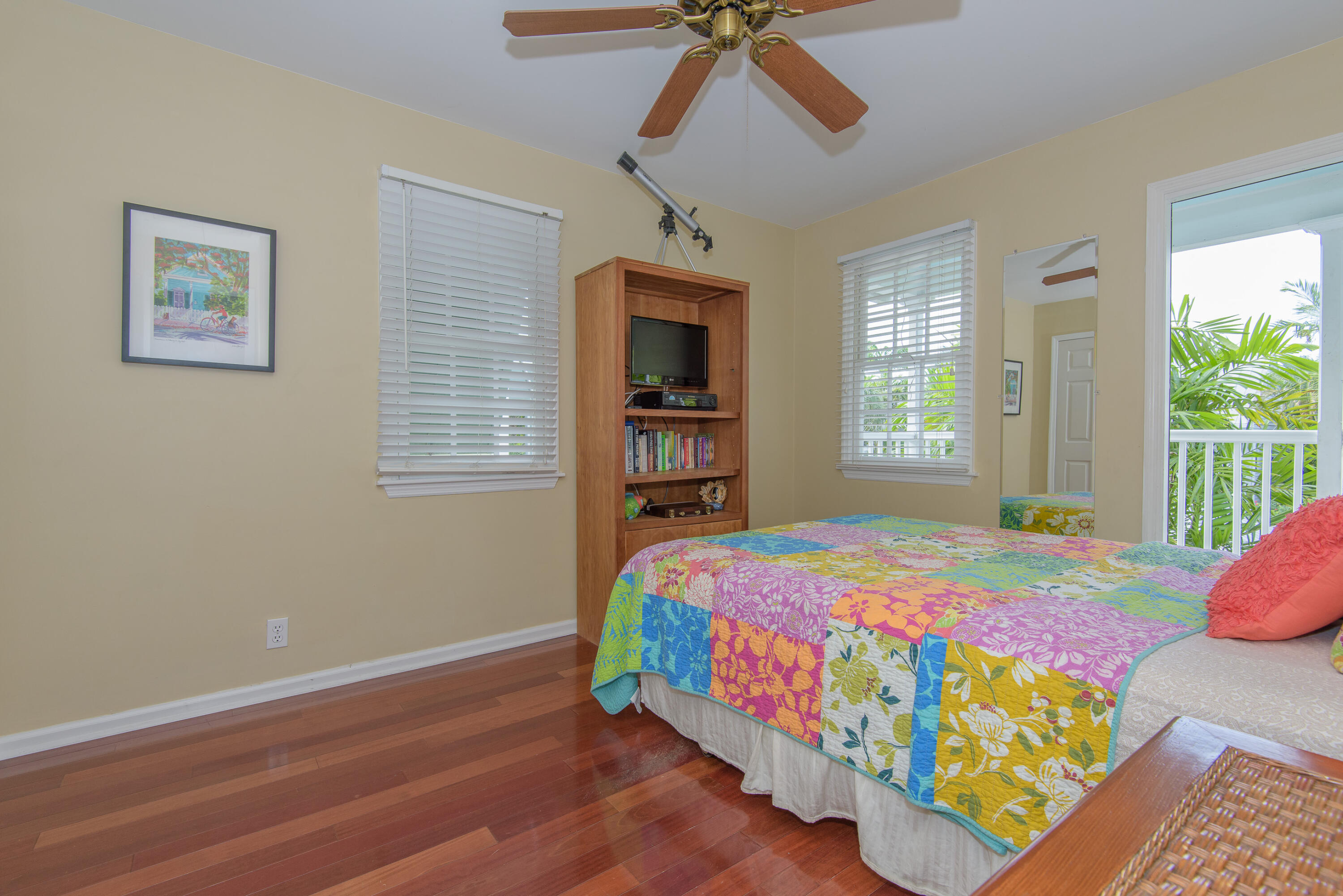 502 Porter Lane Key West, FL 33040 - Photo 31 of 38 a bedroom with a bed and a window