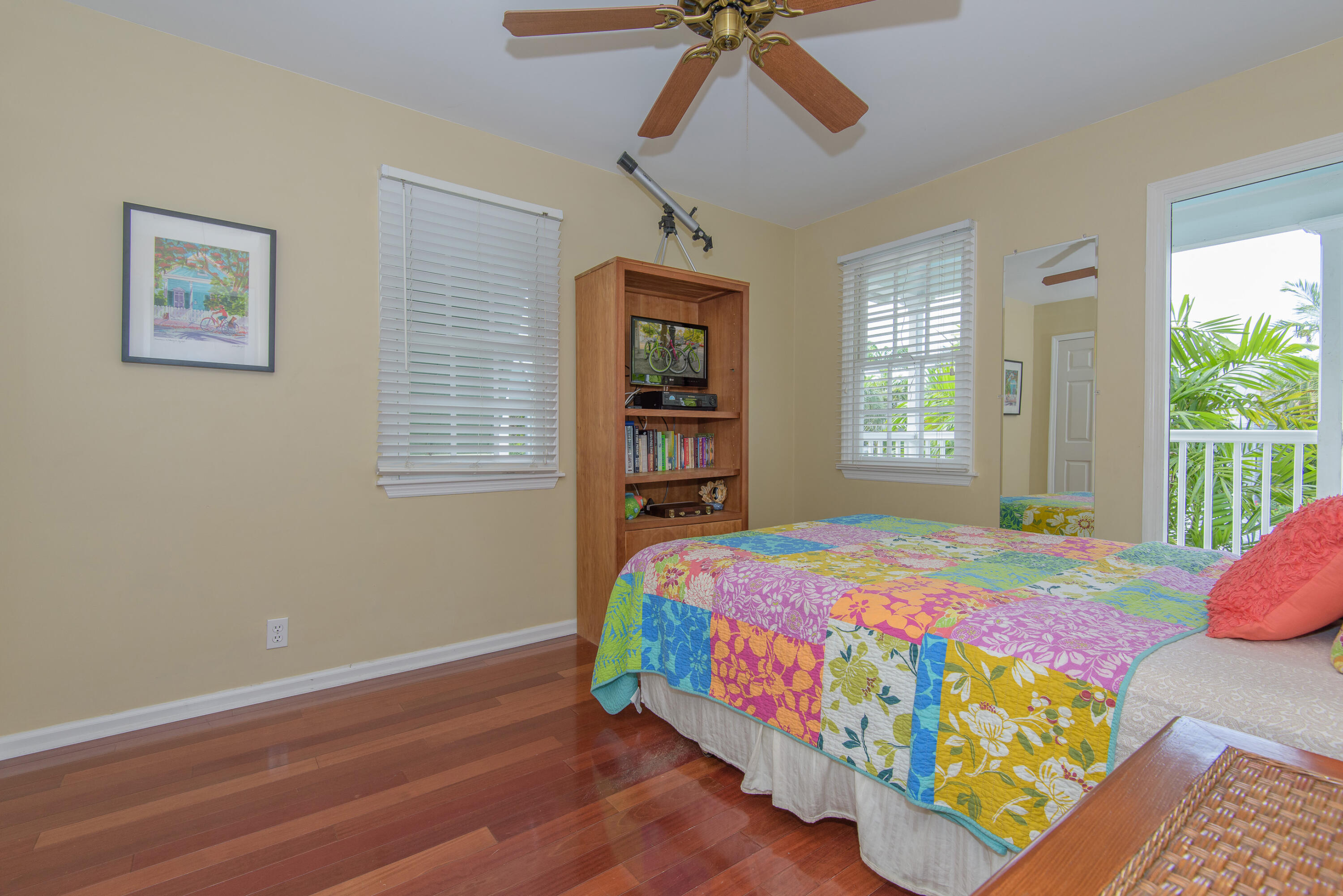 502 Porter Lane Key West, FL 33040 - Photo 32 of 38 a bedroom with a bed and a window