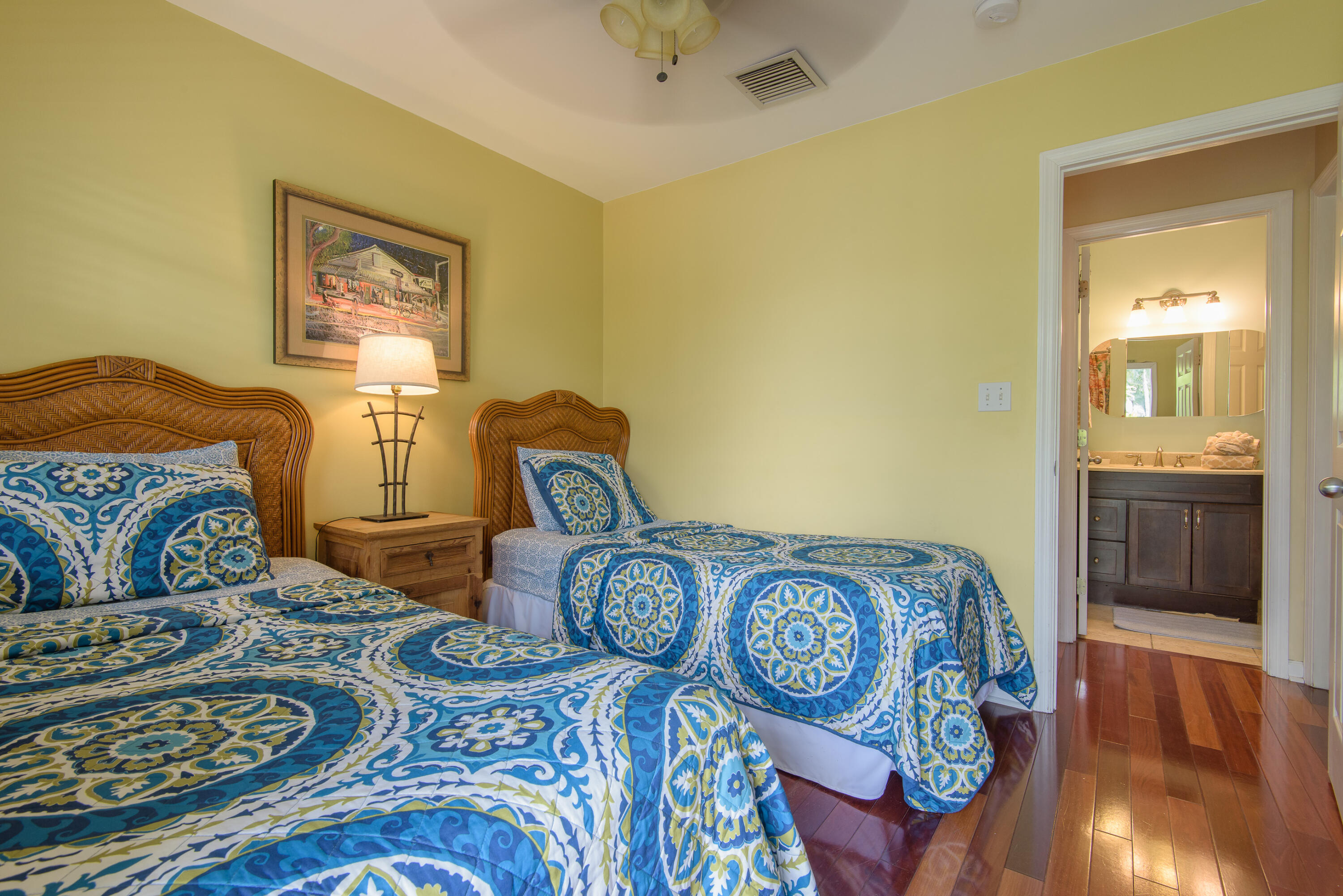 502 Porter Lane Key West, FL 33040 - Photo 38 of 38 a bedroom with bed and wooden floor