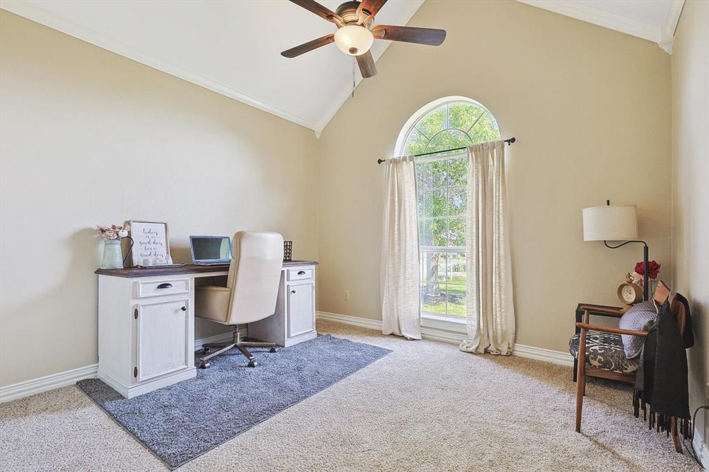 3289 Mitchell Road Krum, TX 76249 - Photo 18 of 40 a workspace with furniture and a window