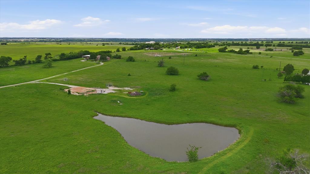 3289 Mitchell Road Krum, TX 76249 - Photo 38 of 40 a view of a field with an ocean