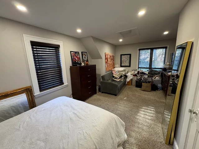 a room with furniture and a flat screen tv