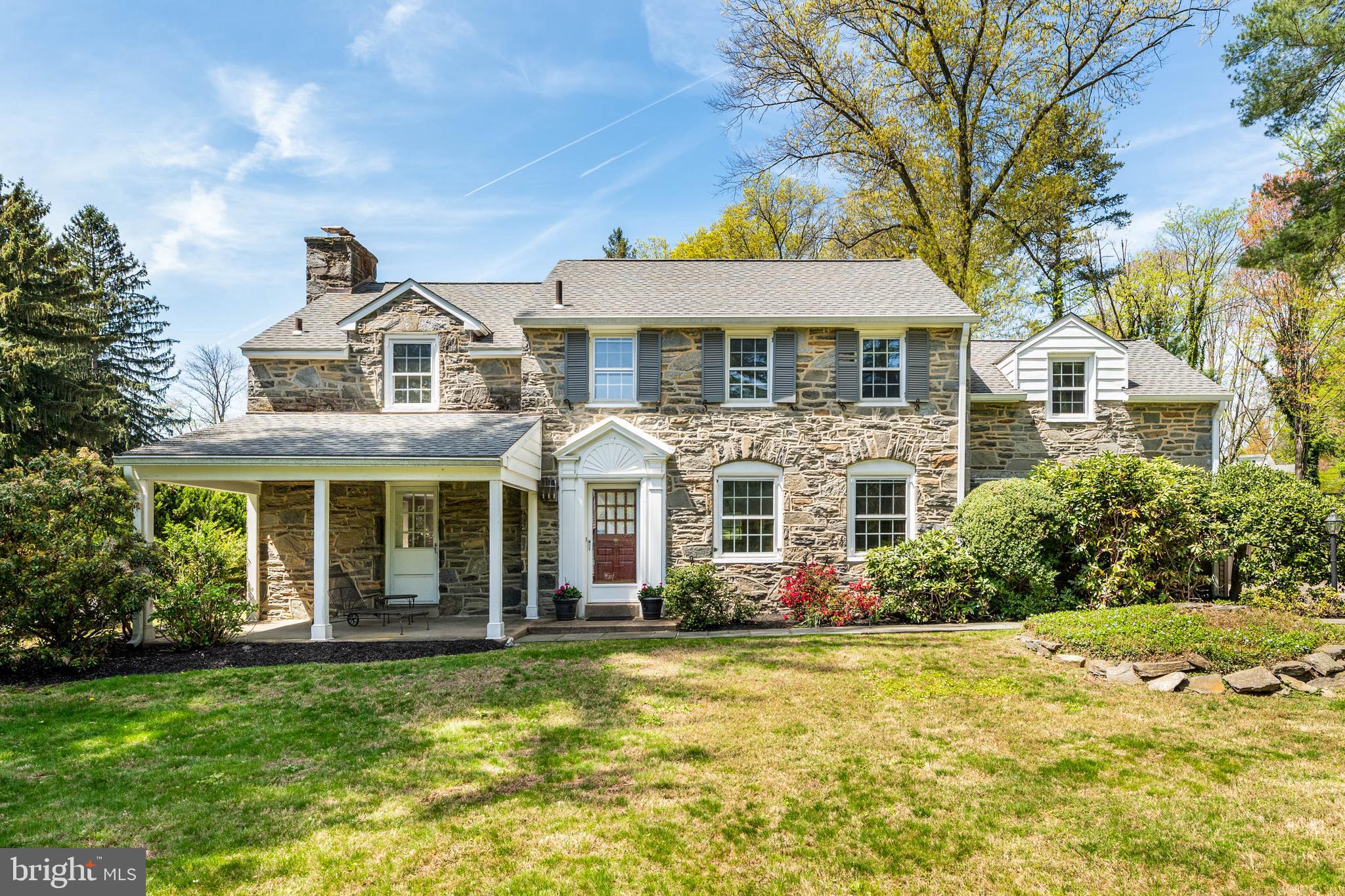912 Centennial Road Penn Valley, PA 19072 - Photo 1 of 54 a front view of a house with a garden