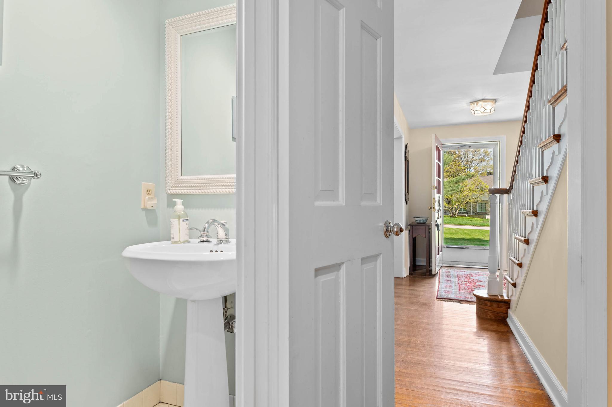 912 Centennial Road Penn Valley, PA 19072 - Photo 20 of 54 a bathroom with a sink a mirror and a shower