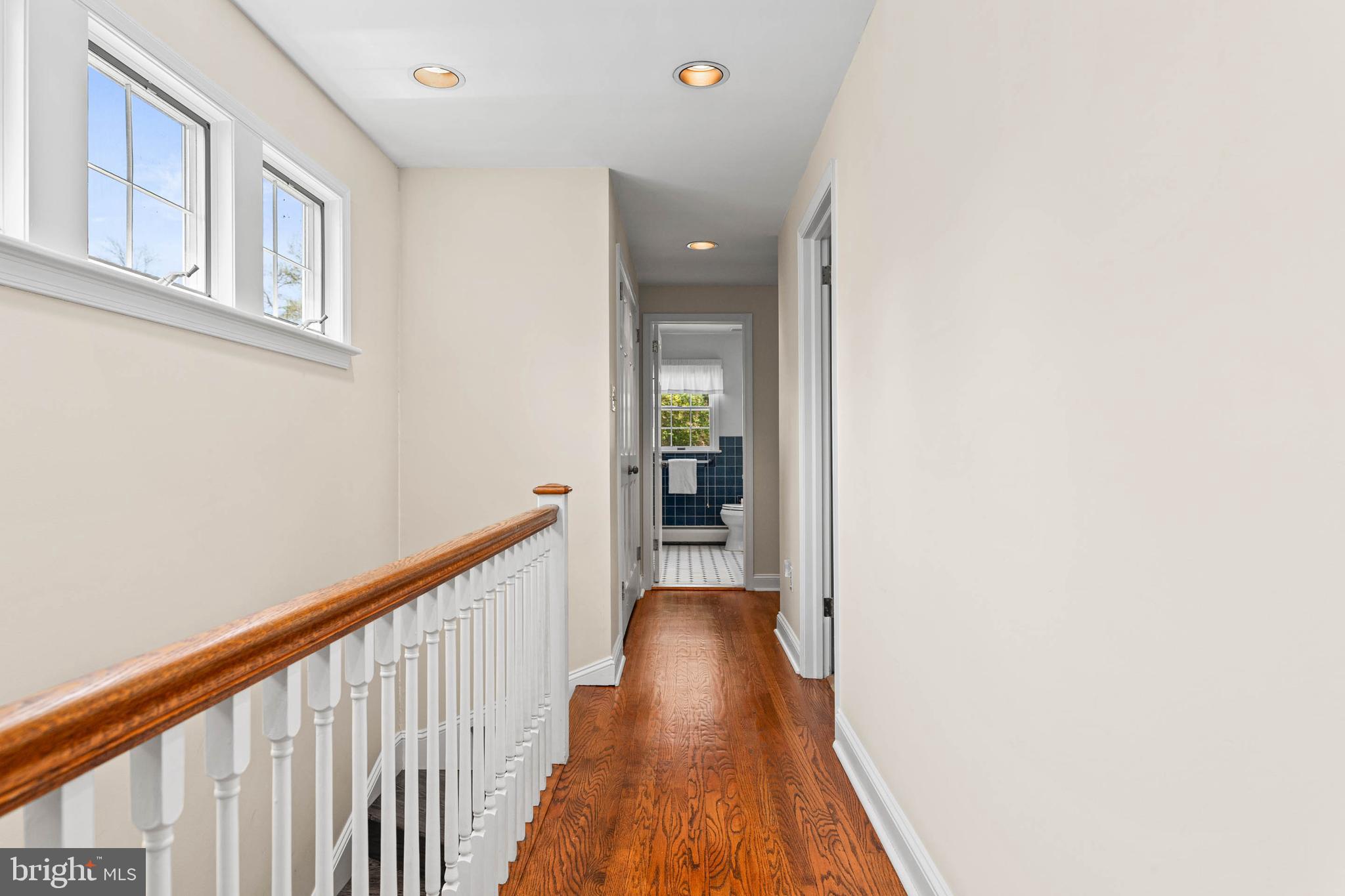 912 Centennial Road Penn Valley, PA 19072 - Photo 23 of 54 a view of a hallway with wooden floor and staircase