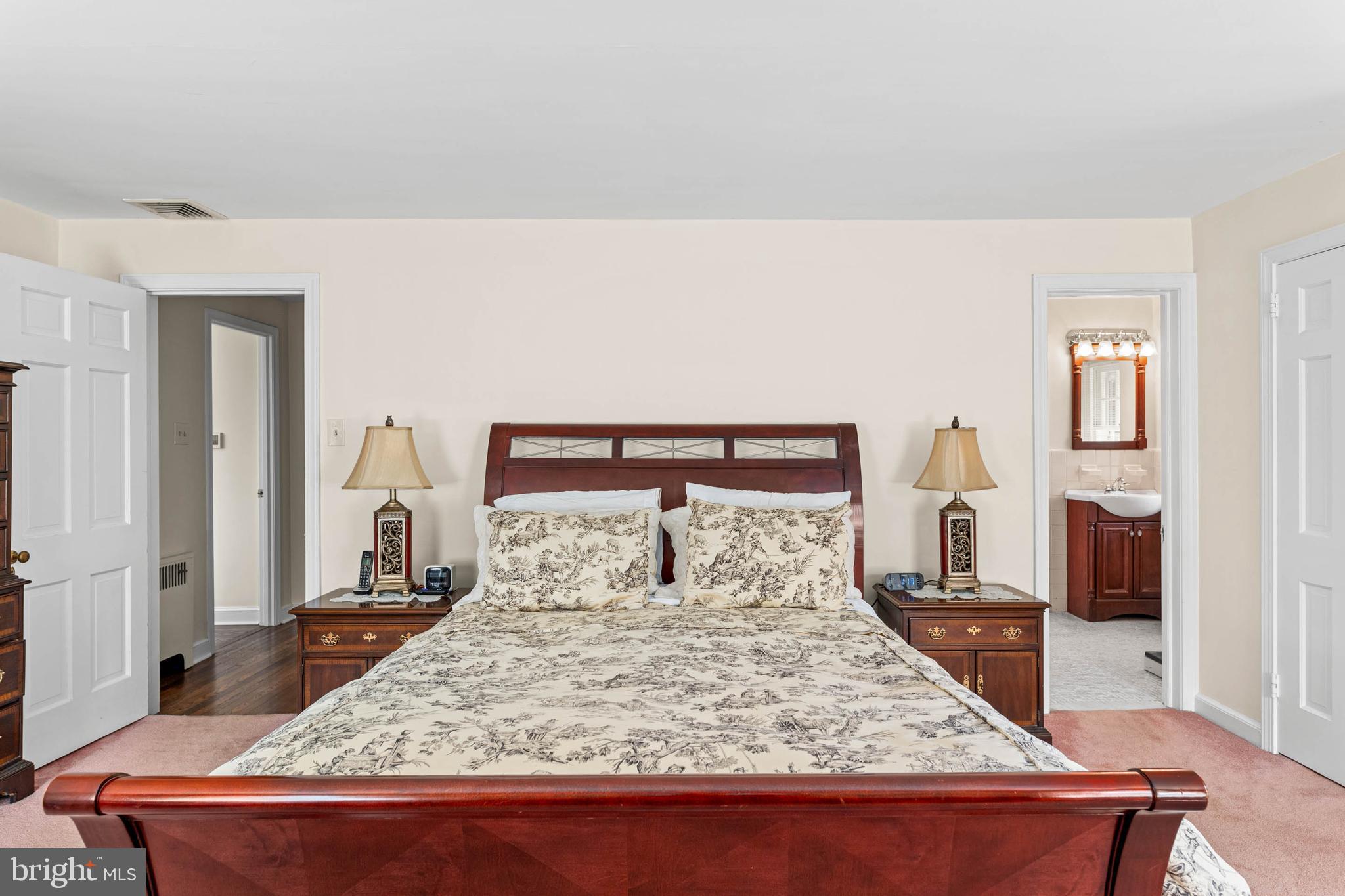 912 Centennial Road Penn Valley, PA 19072 - Photo 26 of 54 a bedroom with a bed and a flat screen tv