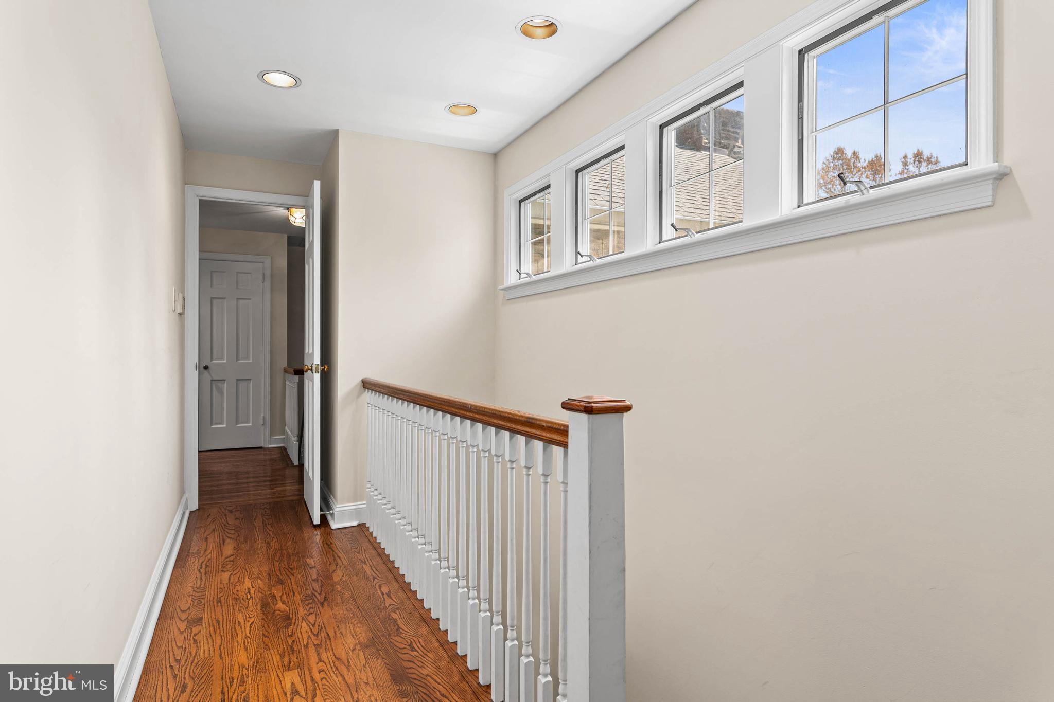 912 Centennial Road Penn Valley, PA 19072 - Photo 40 of 54 a view of a hallway with wooden floor and entryway