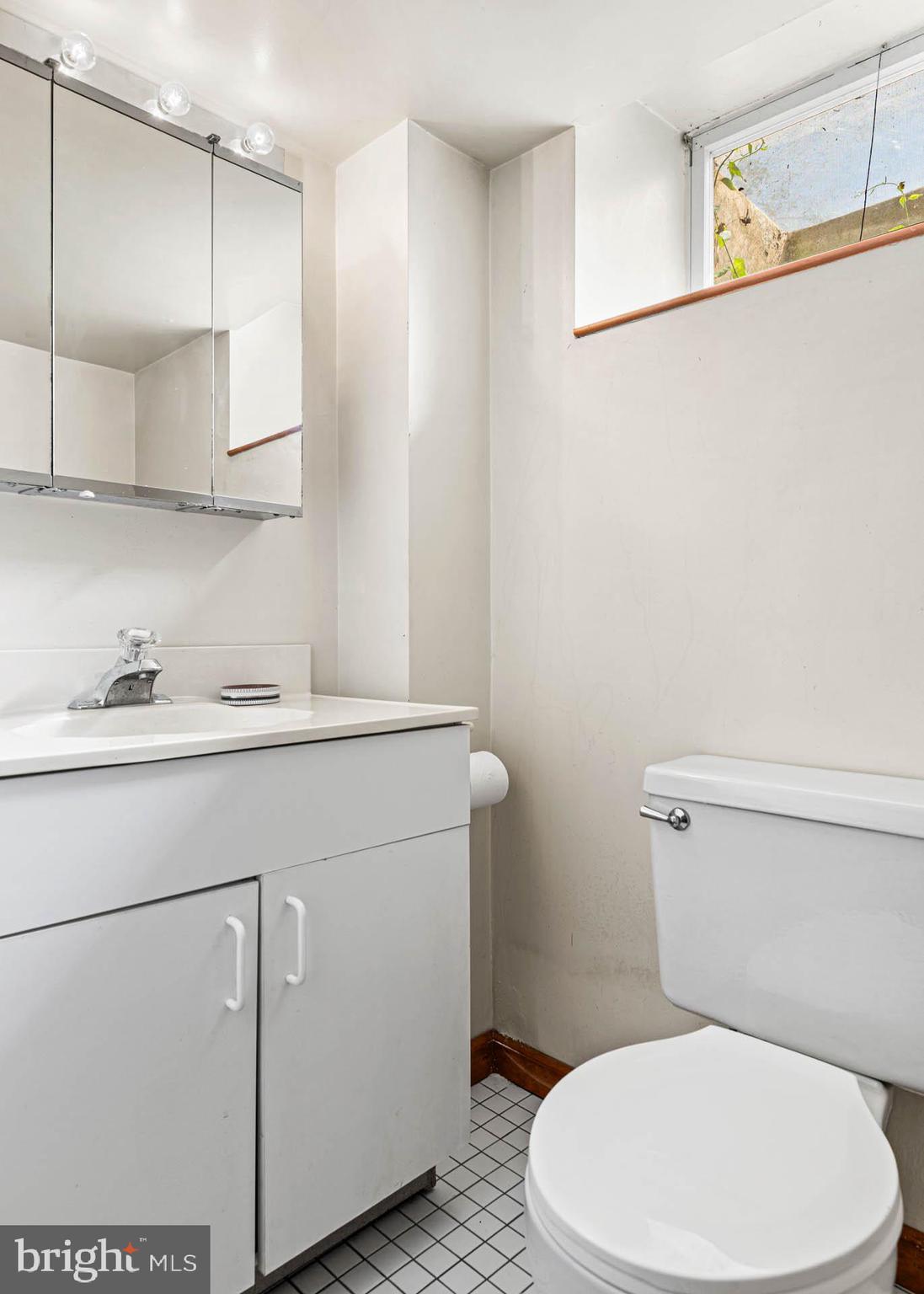912 Centennial Road Penn Valley, PA 19072 - Photo 43 of 54 a white toilet sitting next to a bathroom sink