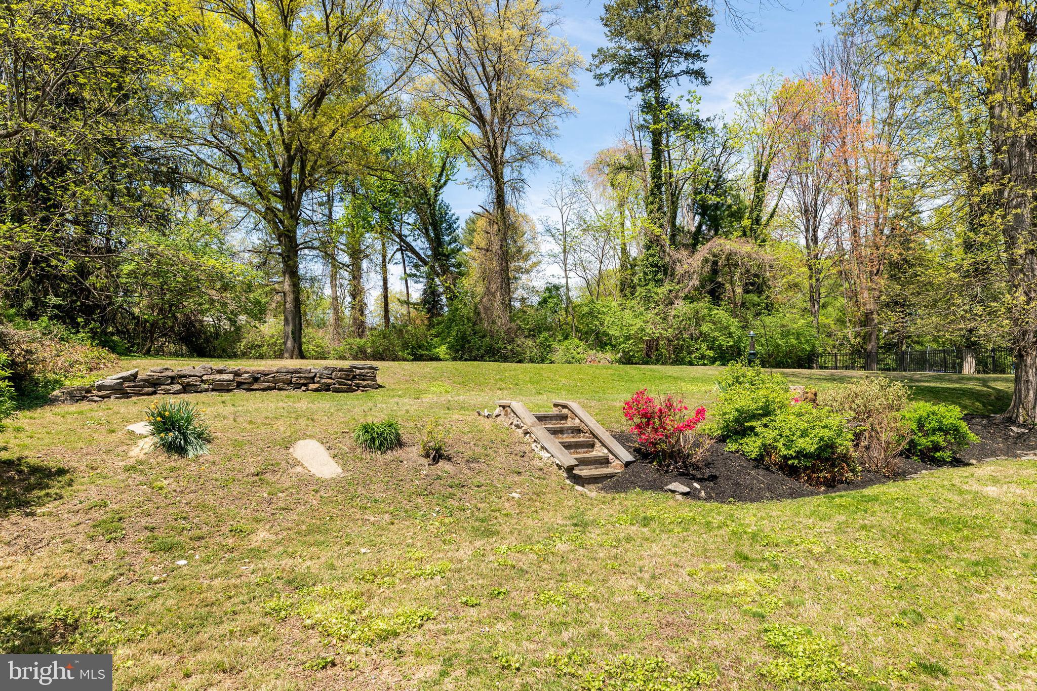912 Centennial Road Penn Valley, PA 19072 - Photo 48 of 54 a view of swimming pool with a yard