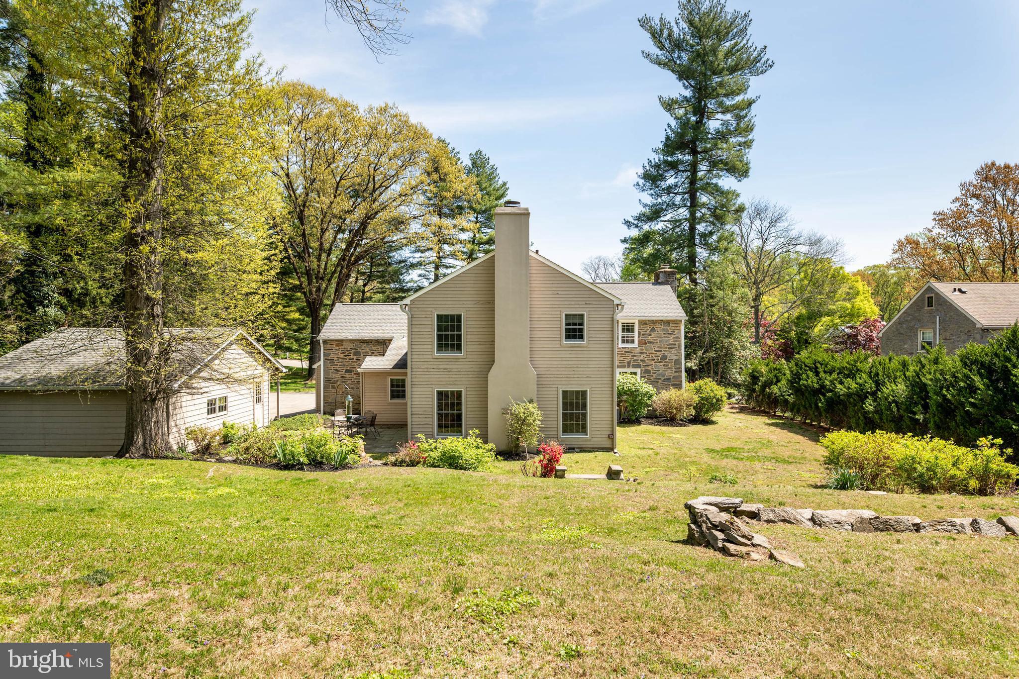 912 Centennial Road Penn Valley, PA 19072 - Photo 50 of 54 a view of a white house with a yard