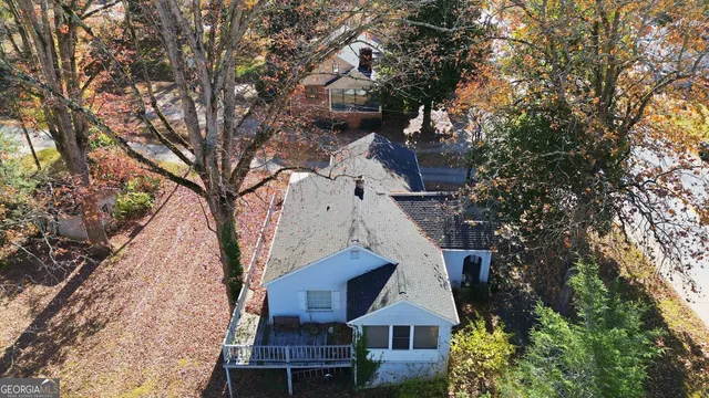 an aerial view of residential house with outdoor space