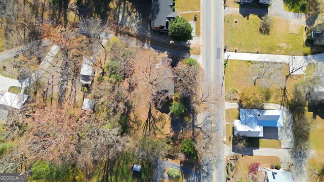 a picture of a bathroom with a shower