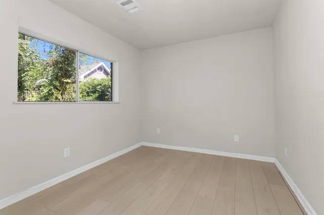 wooden floor and closet in a room