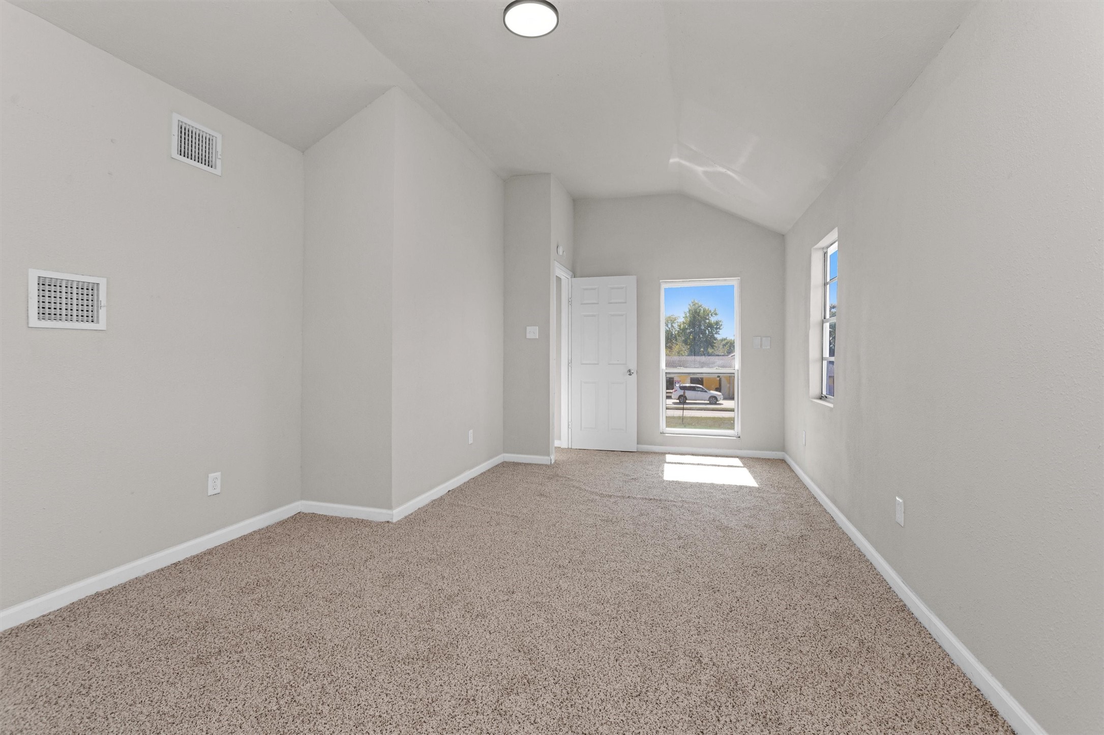 15225 Woodforest Boulevard Channelview, TX 77530 - Photo 24 of 29 a view of an empty room with a window